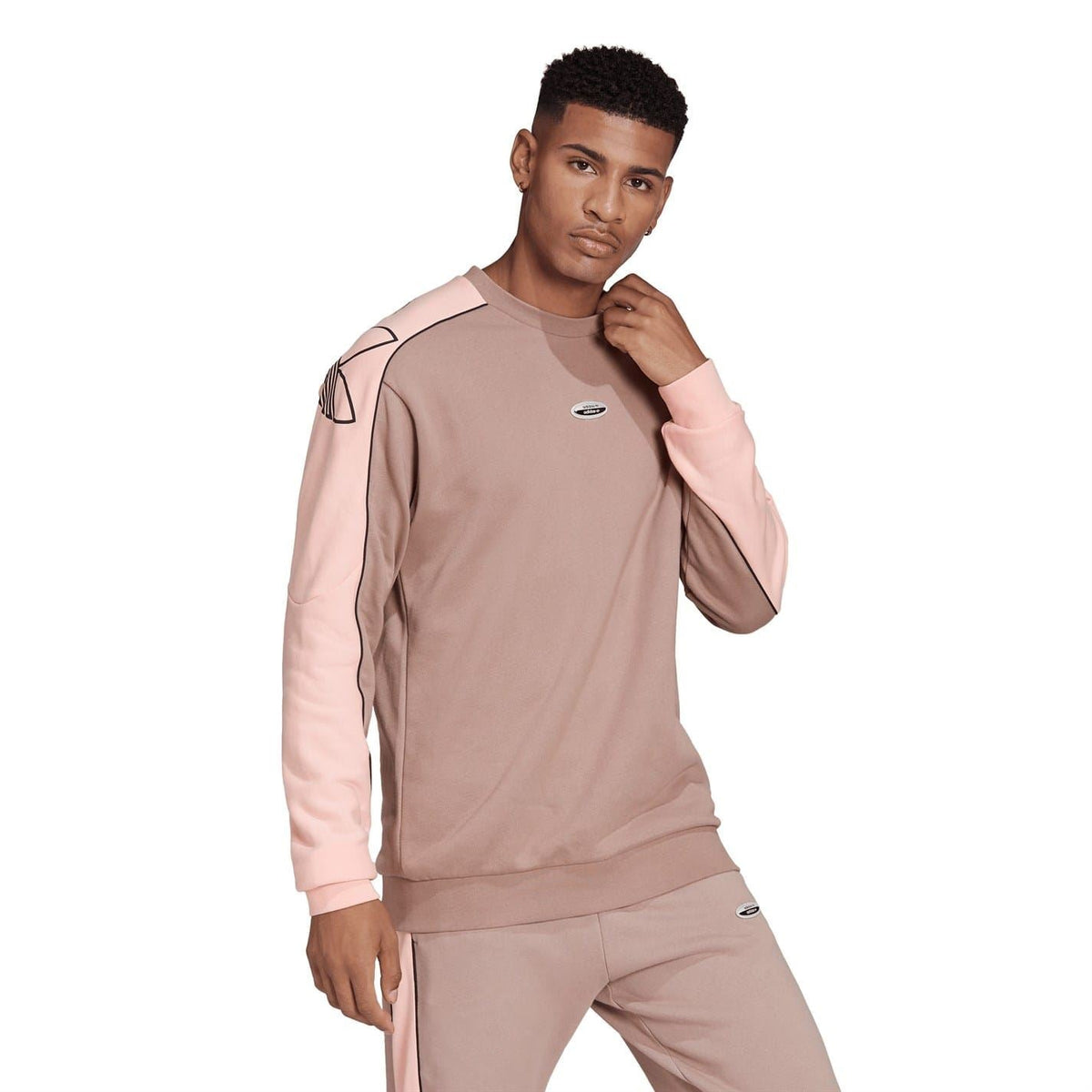 Relaxed crewneck sweatshirt in chalky brown with pink contrast sleeves and adidas chest logo