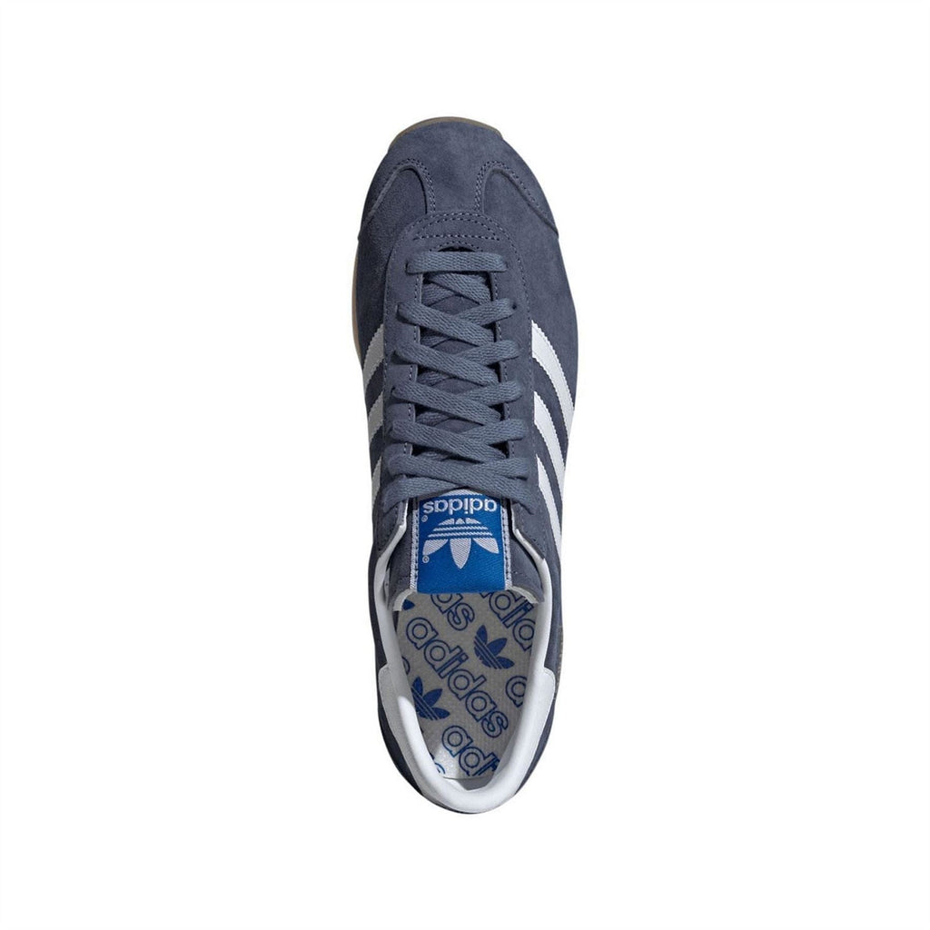 Navy adidas Originals Japan trainers, rear view with lace-up closure and white branding tag
