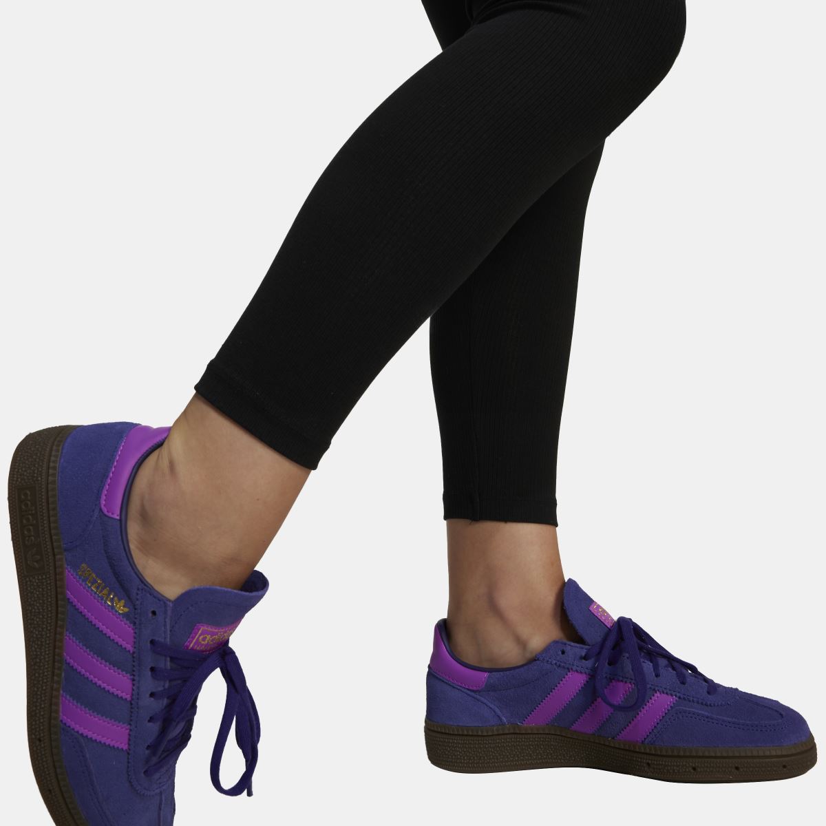 Black ribbed juniors leggings with adidas trefoil logo, ankle-length tapered leg