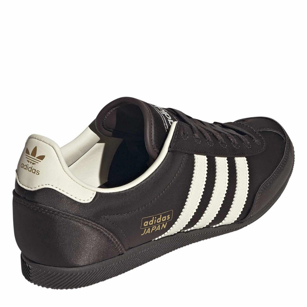 Adidas Originals low-top sneakers, black and cream heel tab with three side stripes