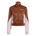 Mock neck track jacket in brown with light pink sleeves; full zip and adidas logo