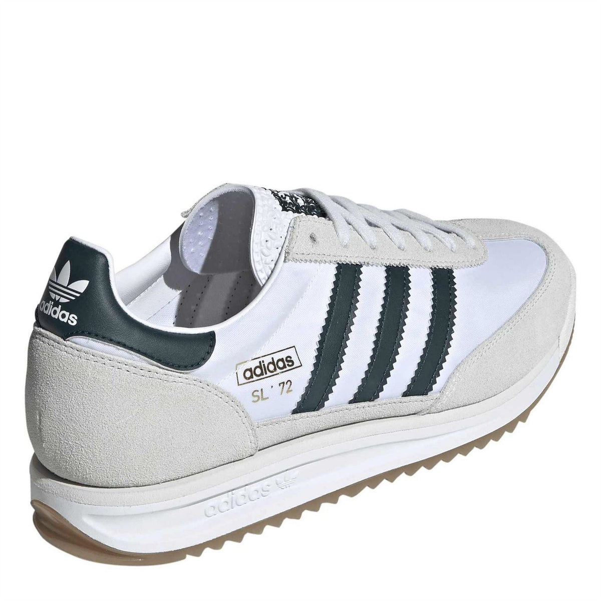 White and grey low-top sneakers with black heel accent and three adidas stripes