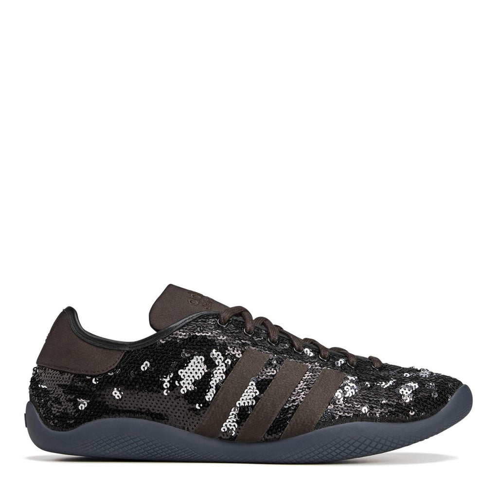 Core Black sequin low-top sneakers with three stripe overlays and dark rubber sole