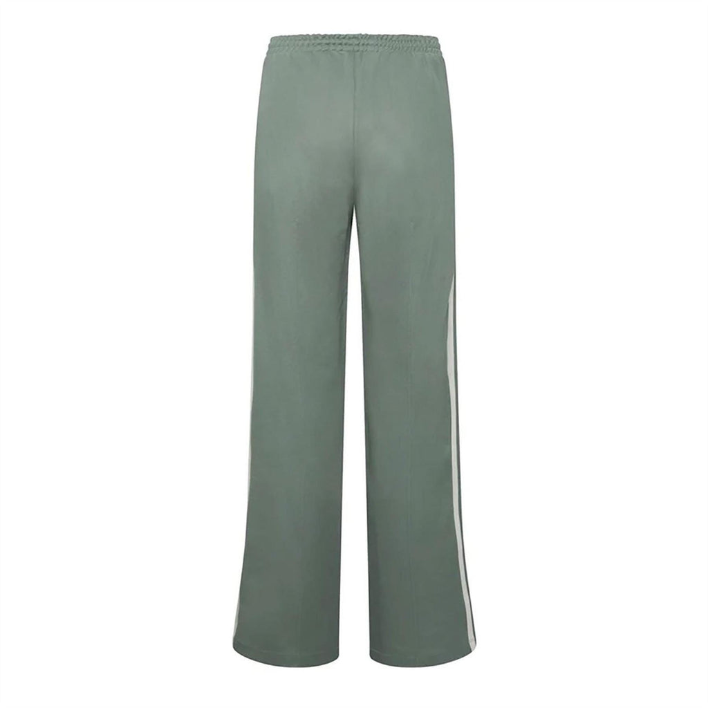 Green adidas track pants with wide leg, elastic waistband, side stripe and trefoil