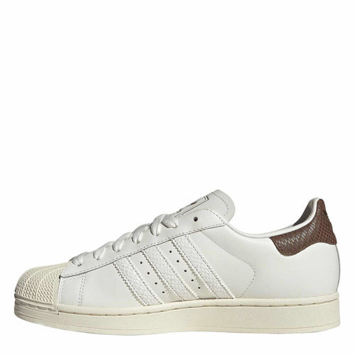 White leather-look adidas Superstar II sneaker with brown collar lining and three stripe overlays.