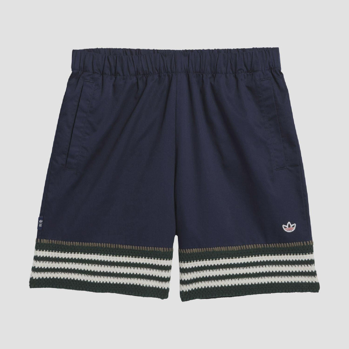 Indigo knit shorts with elastic waistband and striped hem band, small trefoil