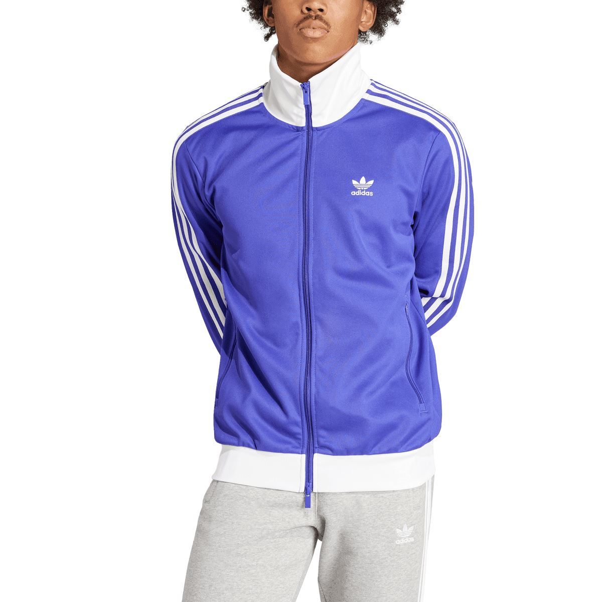 Purple adidas track top with white stripes on sleeves, full-zip front, small chest logo