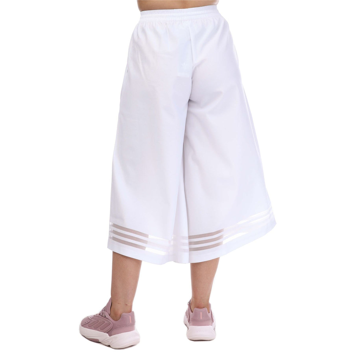 White 3/4 pants with wide-leg drape and striped cuff hem