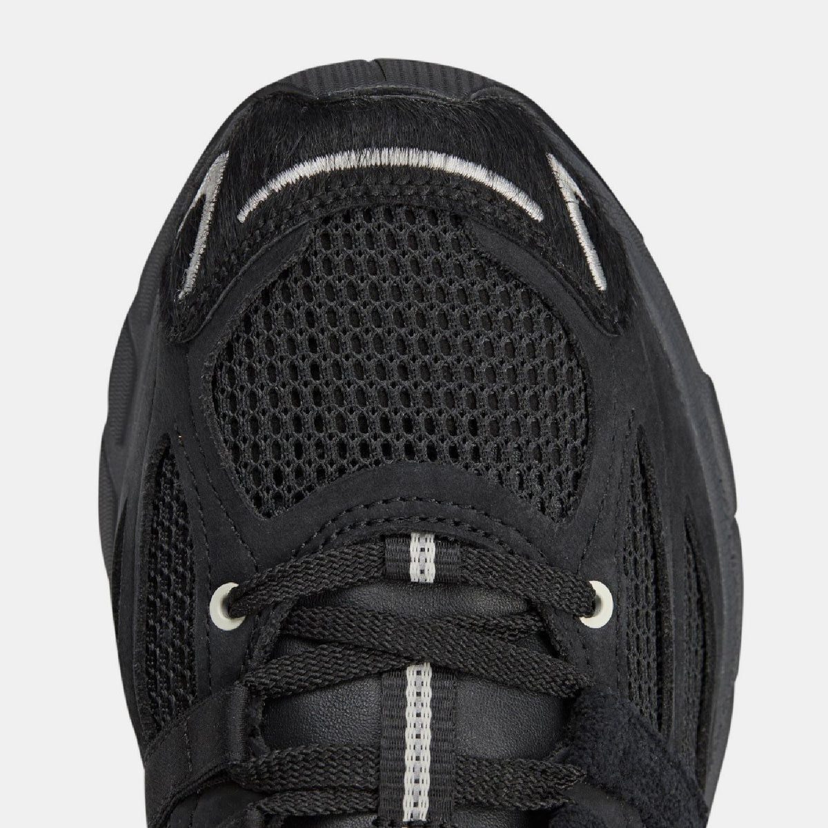adidas Originals Adistar Cushion STFM trainers in black with white accents, lightweight athletic footwear for comfortable running and training