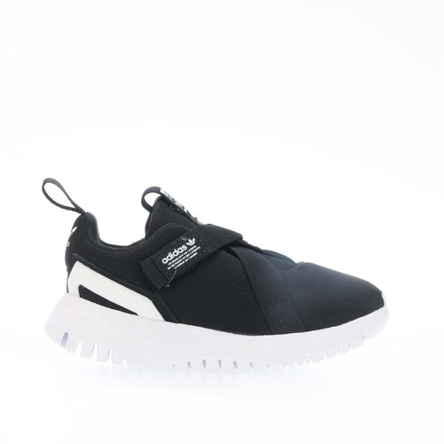 Black and white slip-on trainers with white chunky sole and side stripe