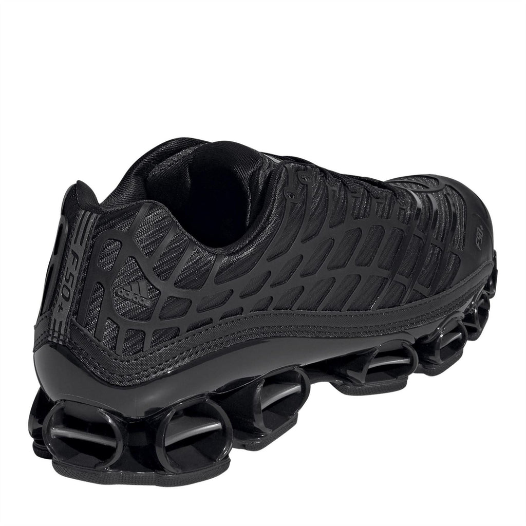 Black adidas Megaride F50 shoe with padded collar and visible circular pod outsole