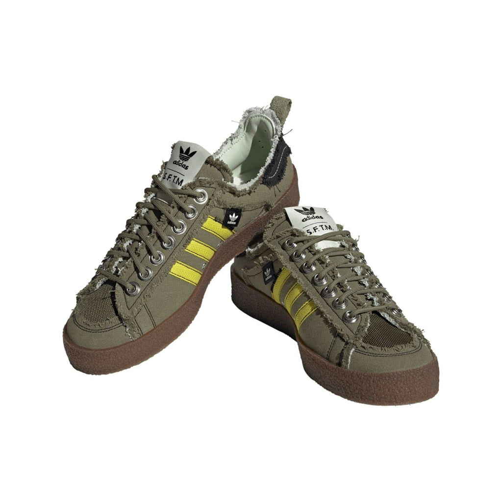 adidas Originals olive low-top trainers with yellow stripes, lace-up, fur-trim cuffs