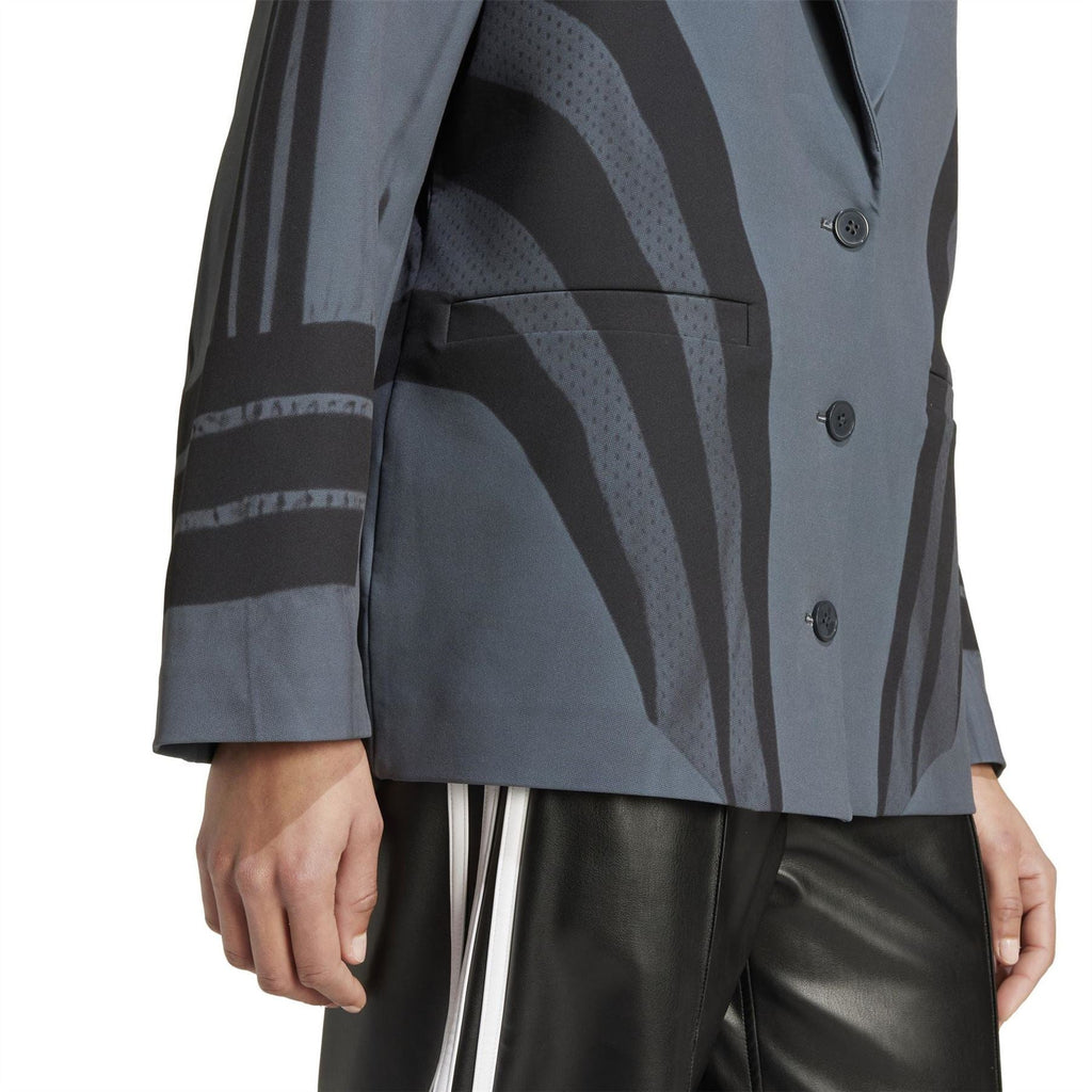 Blue-gray blazer with striped cuff and zebra graphic print, buttoned placket
