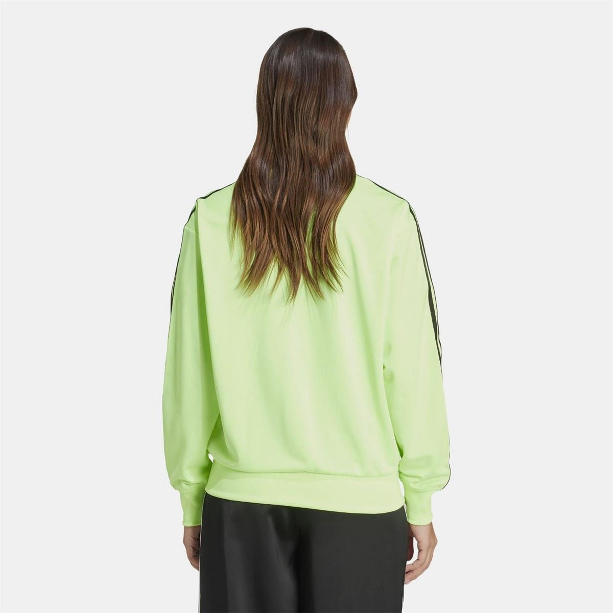 adidas Originals Classic Firebird loose track top sweatshirt in black with iconic trefoil logo and ribbed cuffs.