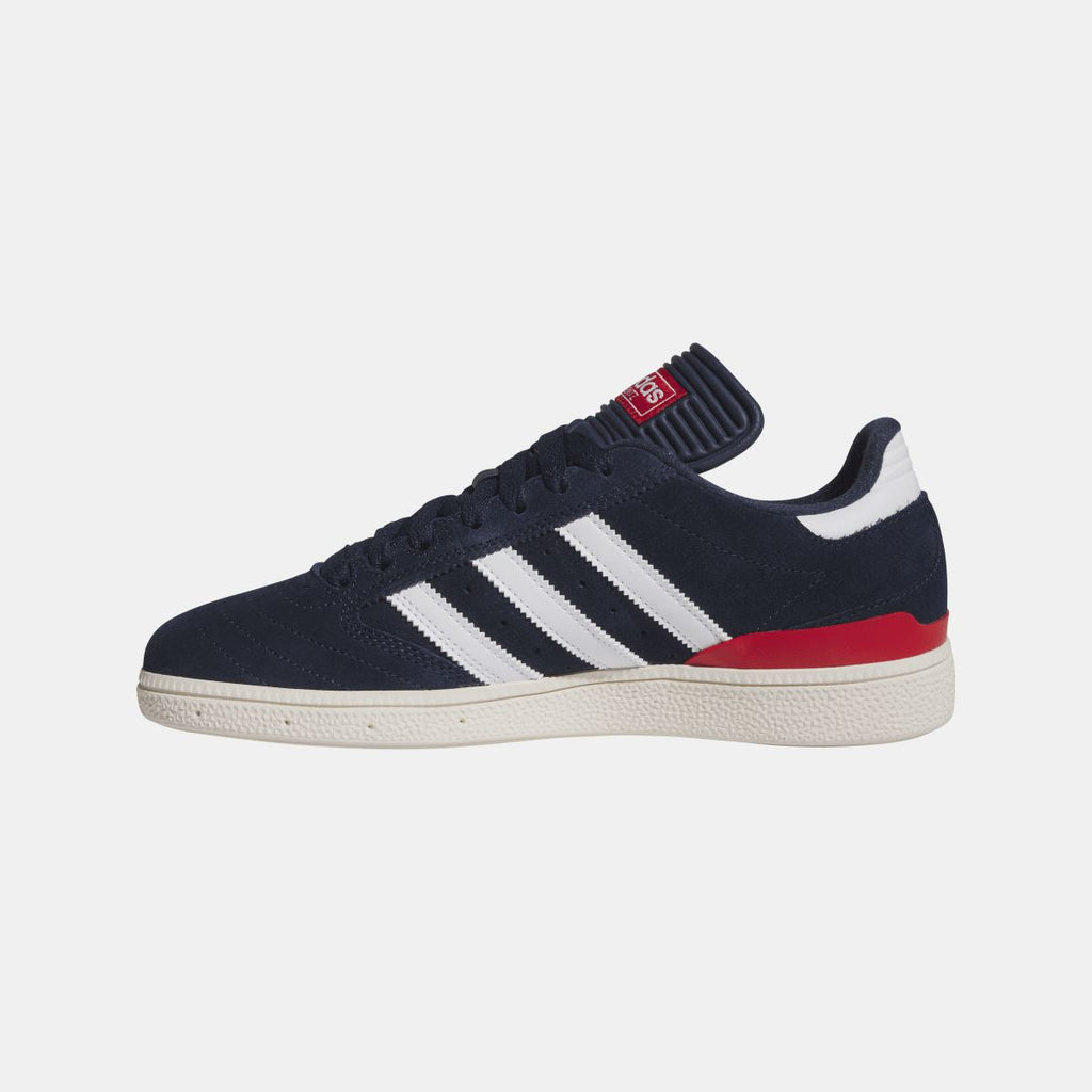 Navy Busenitz low-top sneakers with red stripe and white three adidas stripes