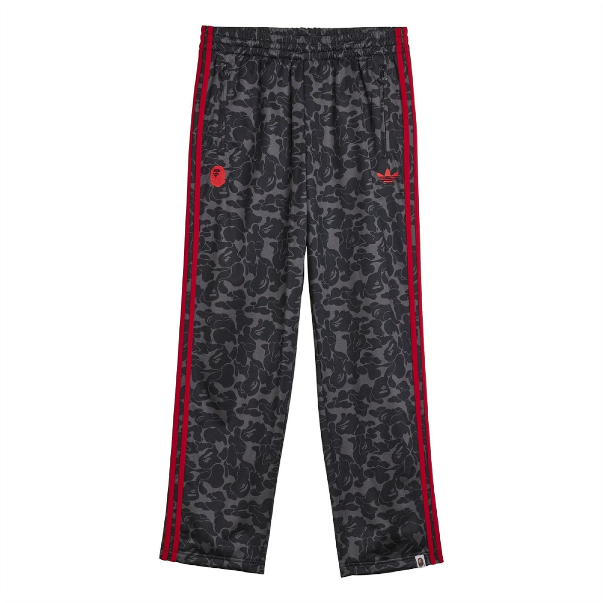 Black camo trackpants with red side stripes, elastic waistband, tapered leg.