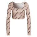 adidas Originals long-sleeve crop top in blush pink with allover adidas logo print