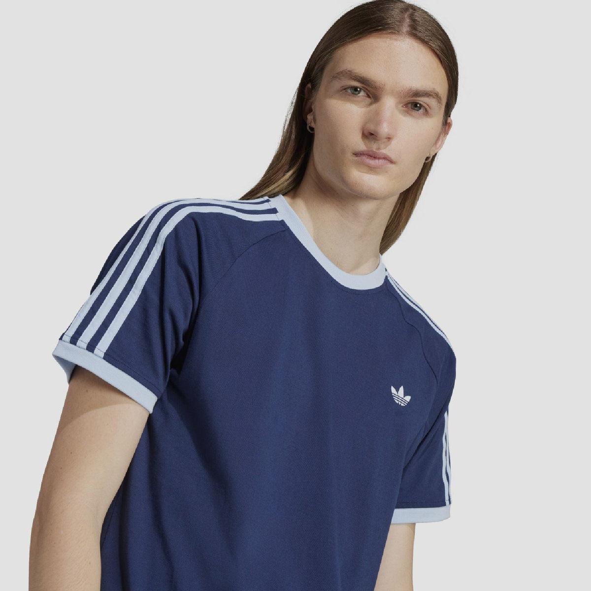 Indigo adidas Originals crew-neck T-shirt with white sleeve stripes and small chest logo