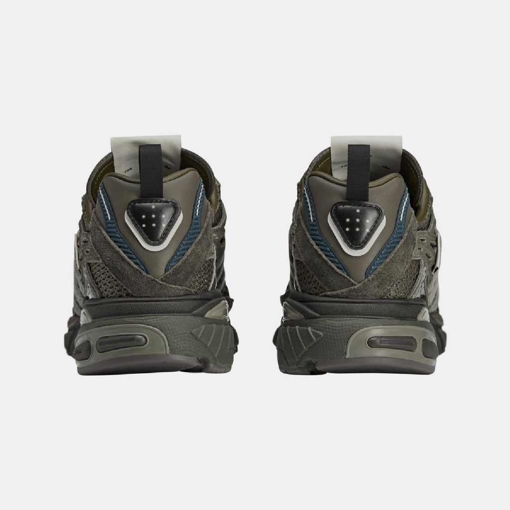 Cushion STFM trainers heel view, padded collar with blue trim and rear pull tab