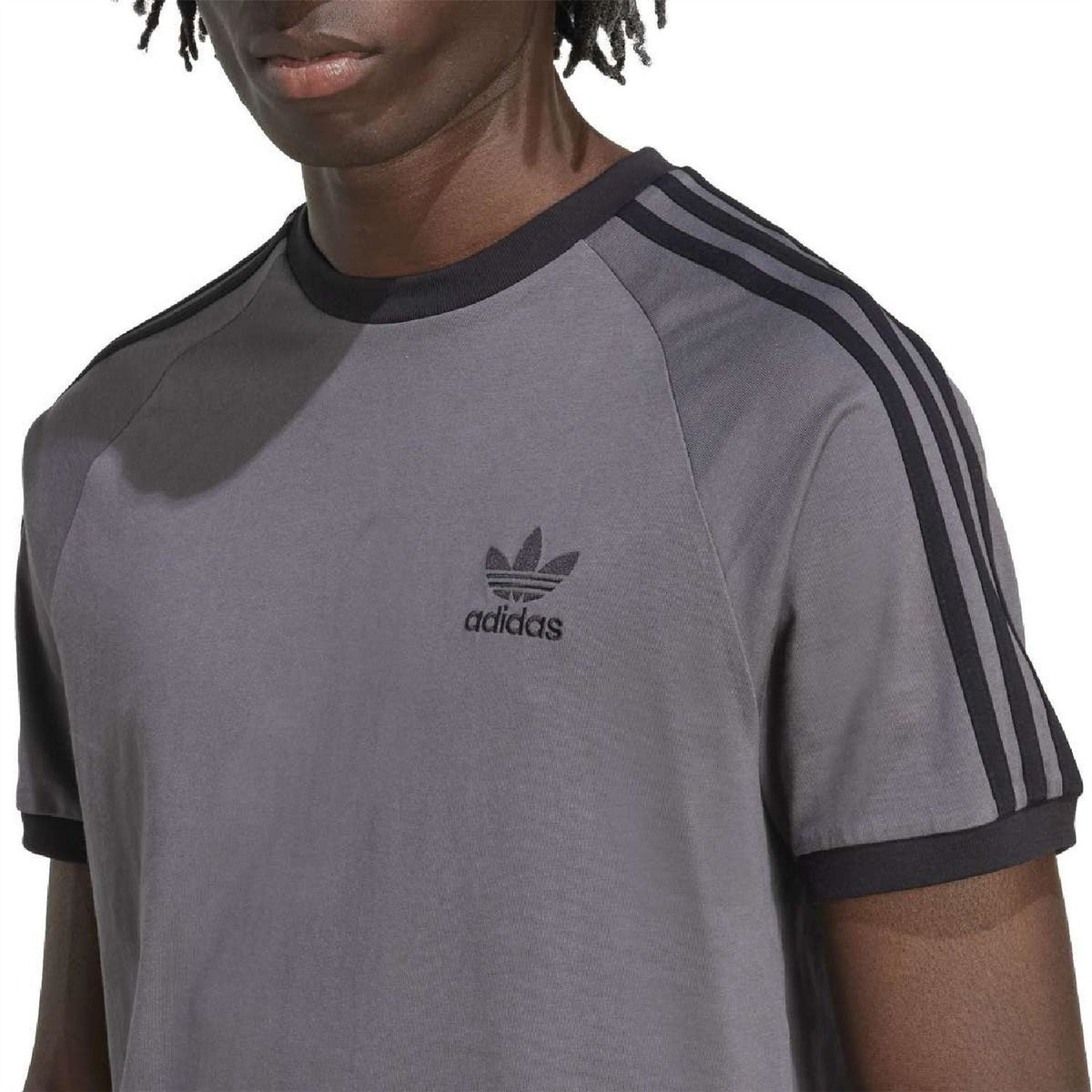 adidas Originals Adicolor Classics 3-Stripes T-Shirt in white with iconic three-stripe design on front and Adidas logo.