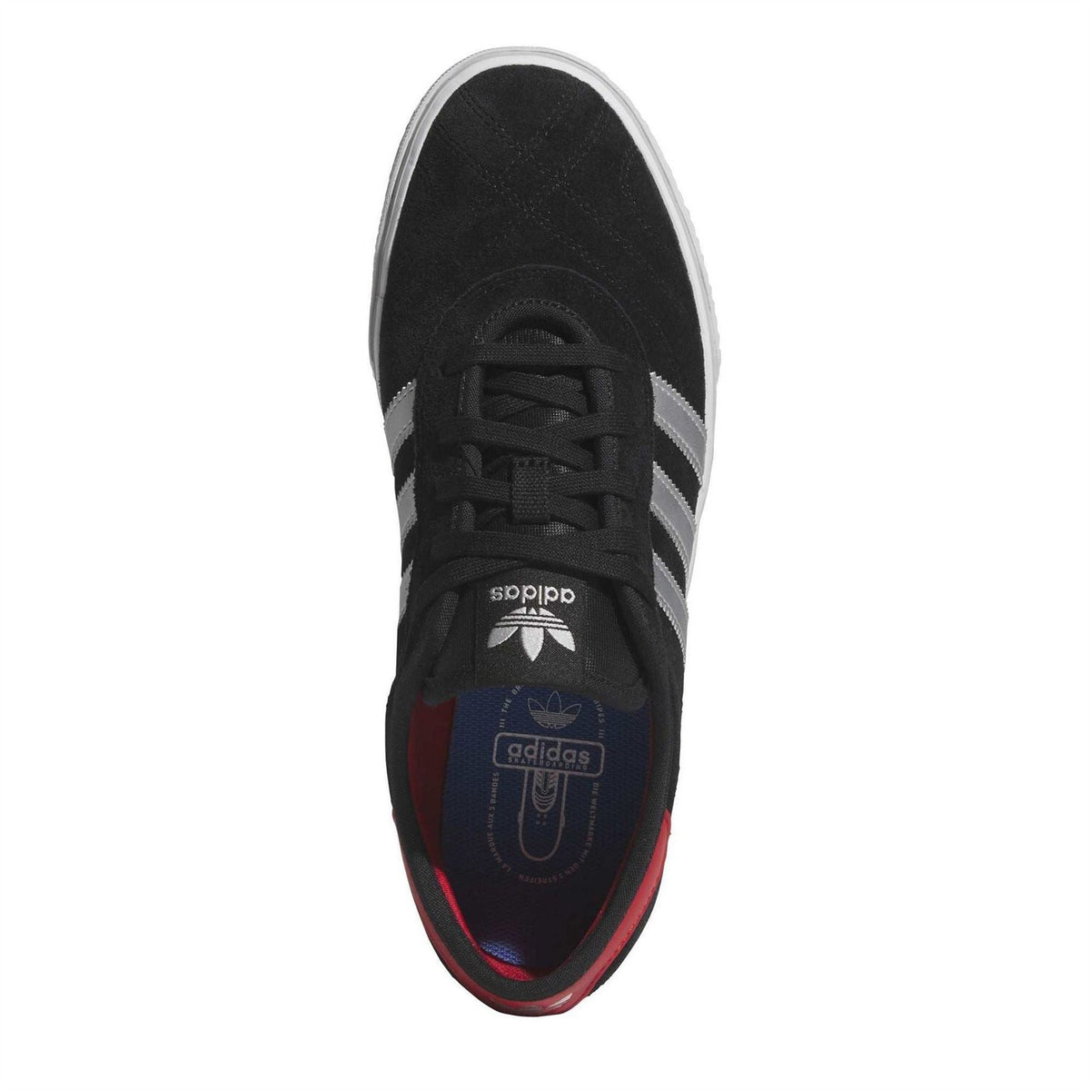 Black suede sneaker top view with lace-up closure and white side stripes, red lining.