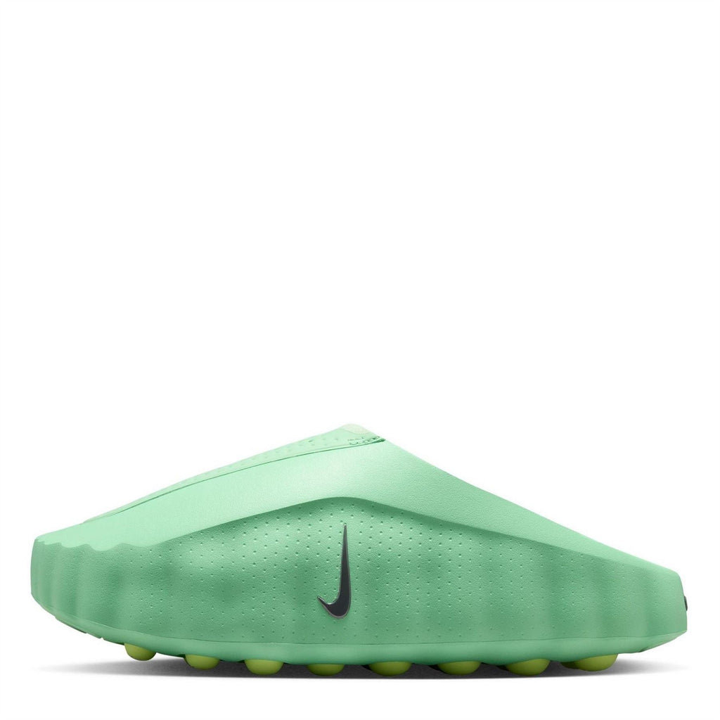 Volt green slide sandals side view, molded tread pods on outsole