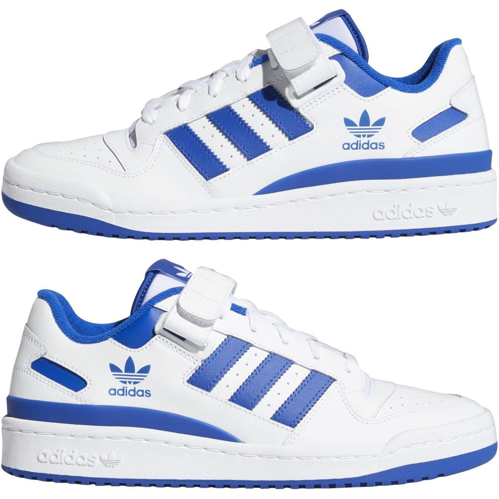 Pair of white and blue low-top trainers with strap closure and adidas three stripes