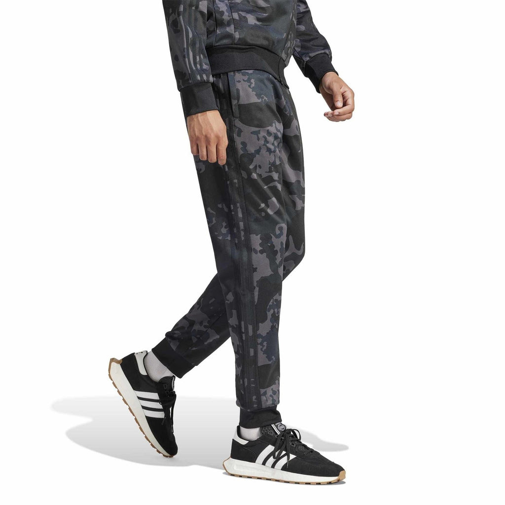 adidas Originals camo track pants, dark charcoal camouflage pattern and tapered ankle cuffs