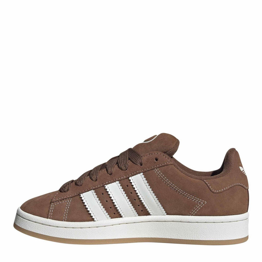 Brown suede low-top sneakers with white triple stripes and lace-up front