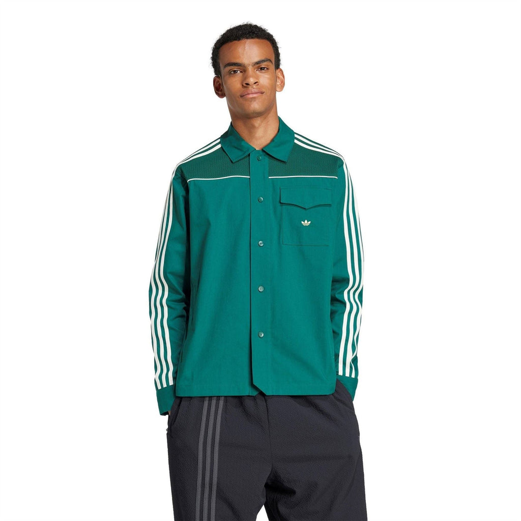 Green button-up jacket with stand collar and white triple sleeve stripes, trefoil logo