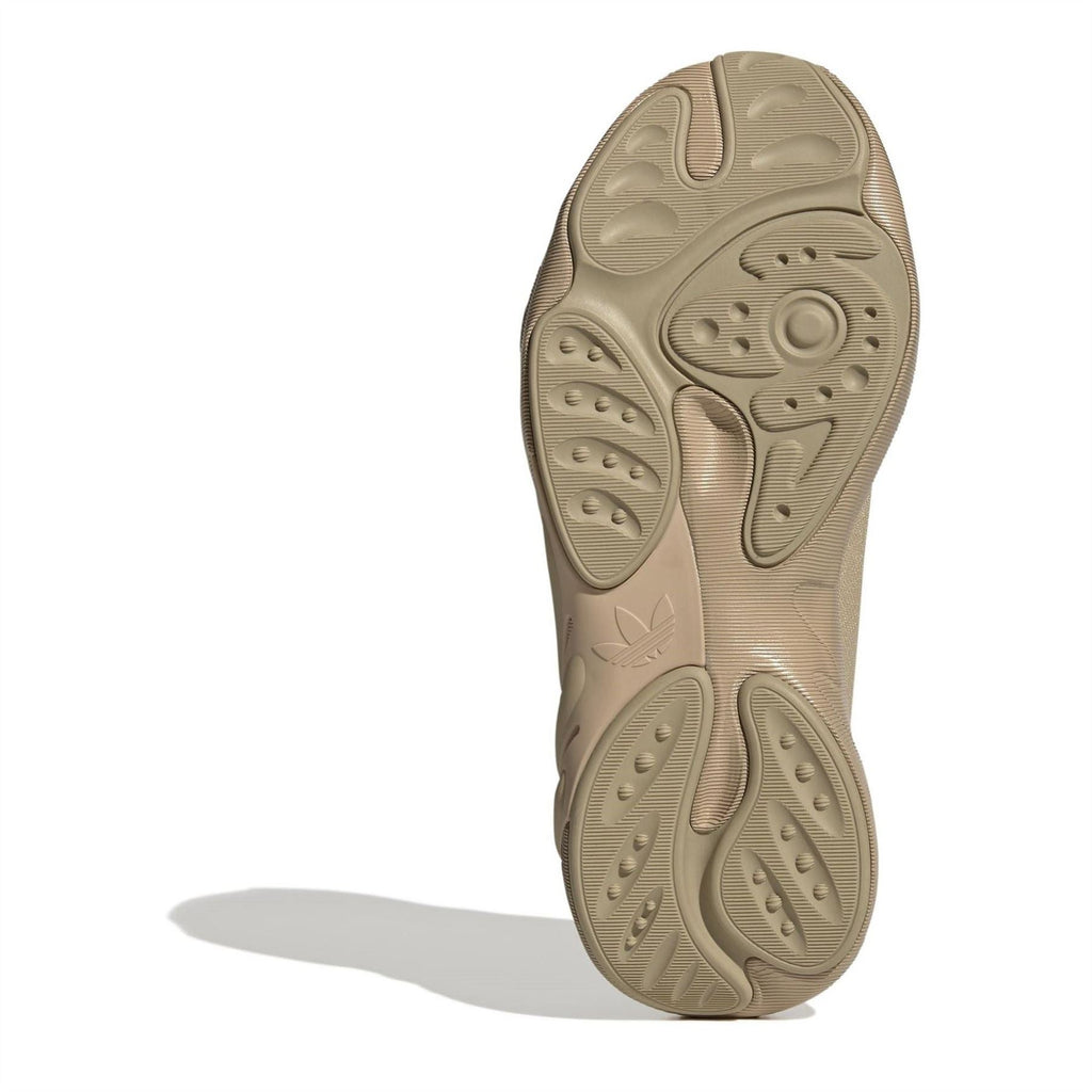 Beige low-top trainers outsole with traction tread pattern
