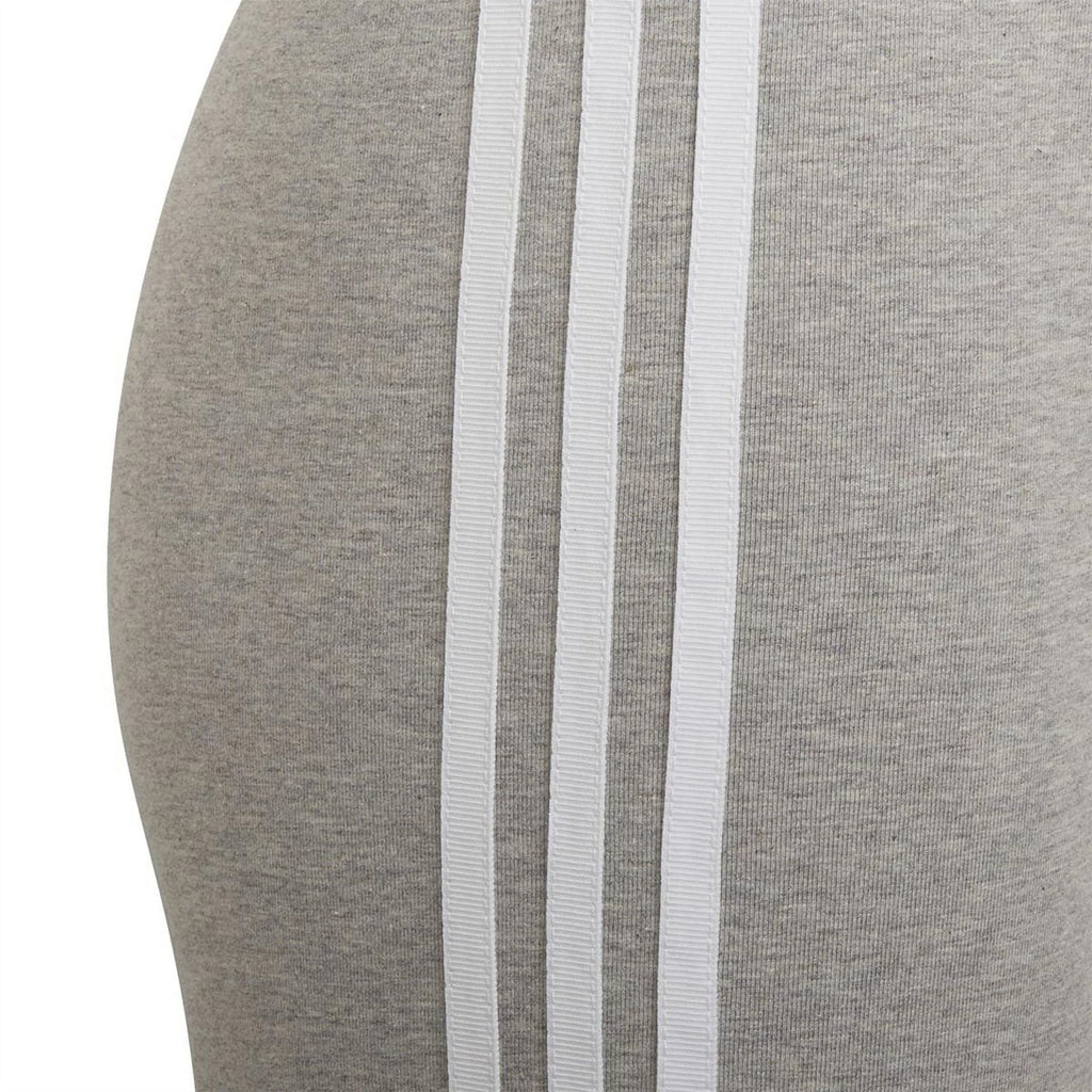 Grey fabric shorts with vertical triple white side stripes along the leg seam