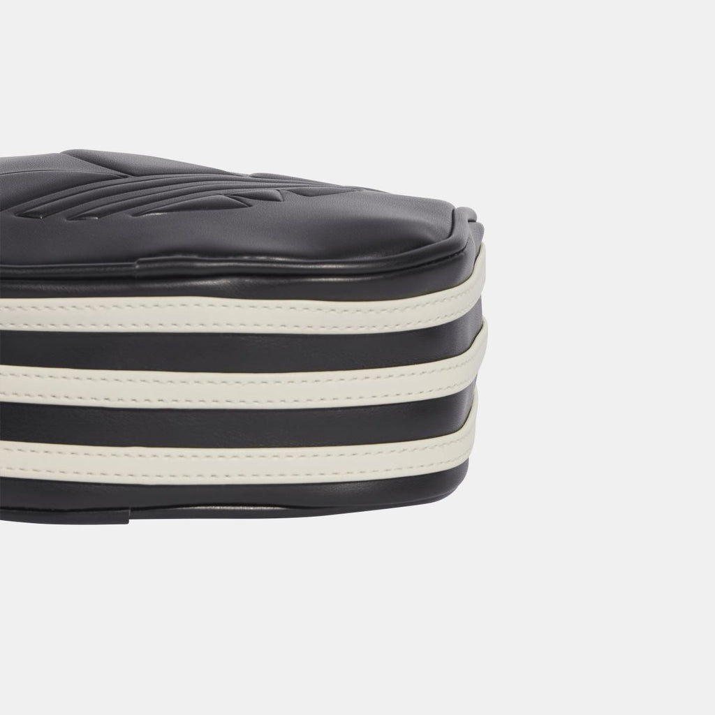 Men's adidas Originals Diamond-Shaped Bag with adjustable strap and front logo, stylish and functional for everyday use.