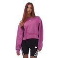 Purple crewneck sweatshirt with long sleeves and small adidas logo on chest