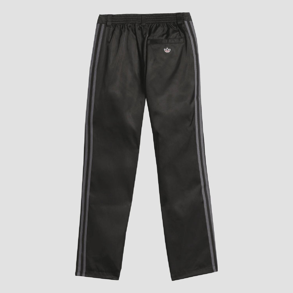 adidas Originals black tracksuit bottoms with elastic waist and side stripe taping