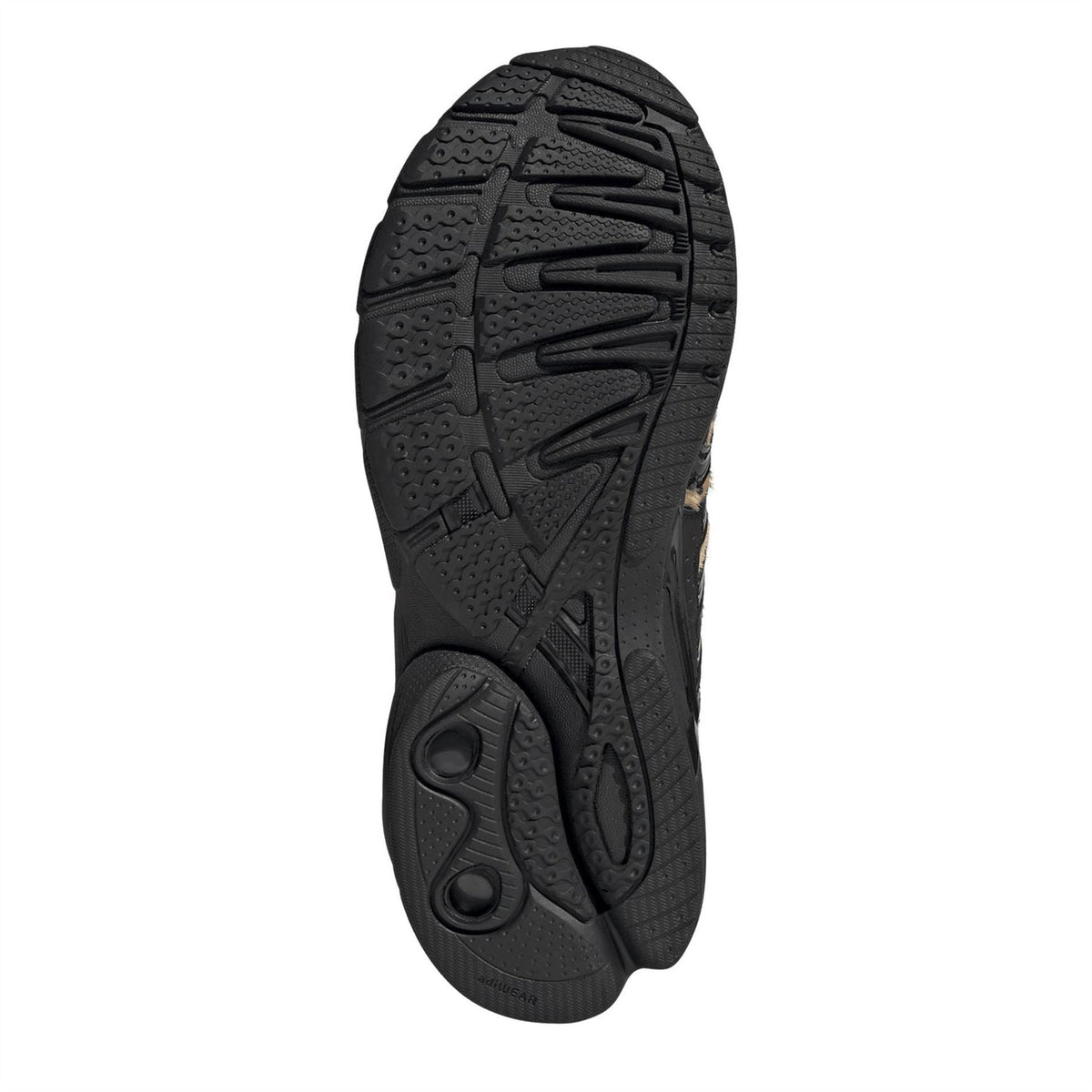 Black sneaker outsole with tread and molded traction pattern
