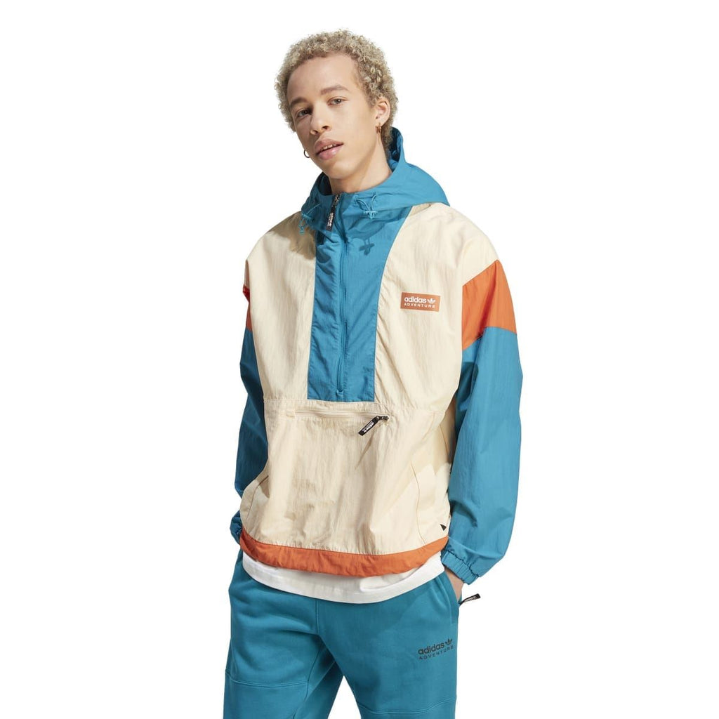 adidas Originals hooded windbreaker jacket worn with matching pants, side view