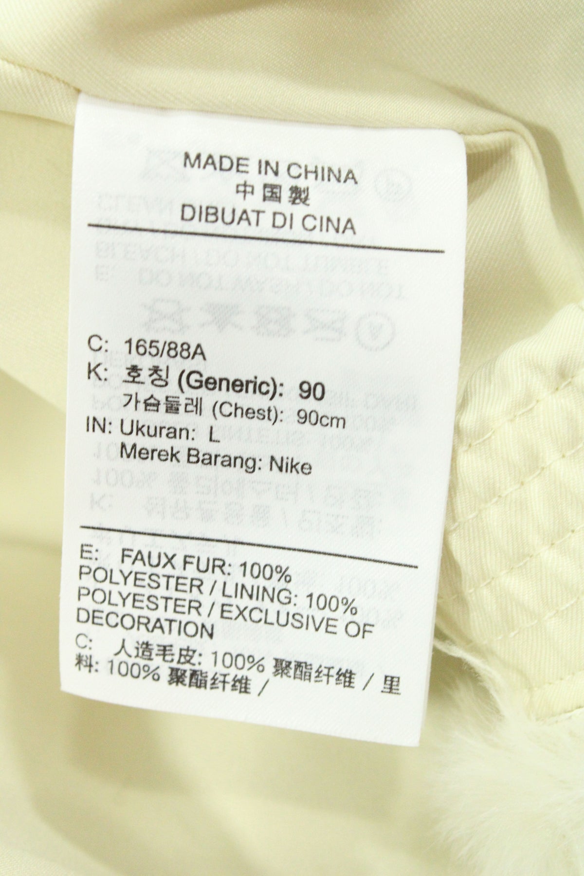Nike Big Swoosh Jacket in Cream Faux Fur