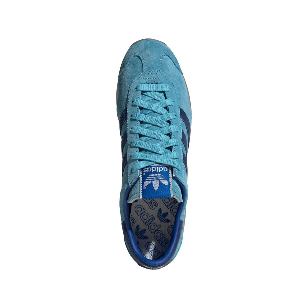 Blue adidas Originals Country Japan trainers, front view with lace-up closure
