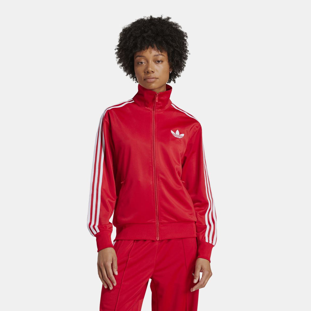 Red track jacket with high neck, full zip, and white side stripe detailing