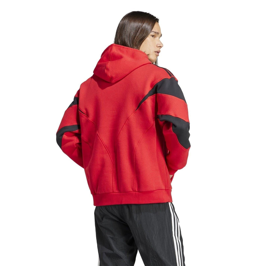 Red hooded sweatshirt with black sleeve panels, shown from the side.