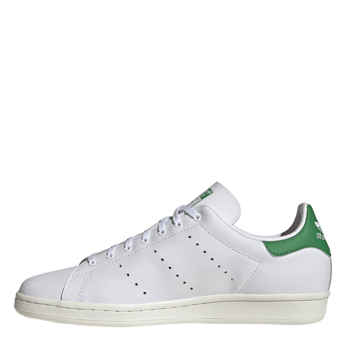 White low-top sneakers with green collar panel and lace-up eyelets