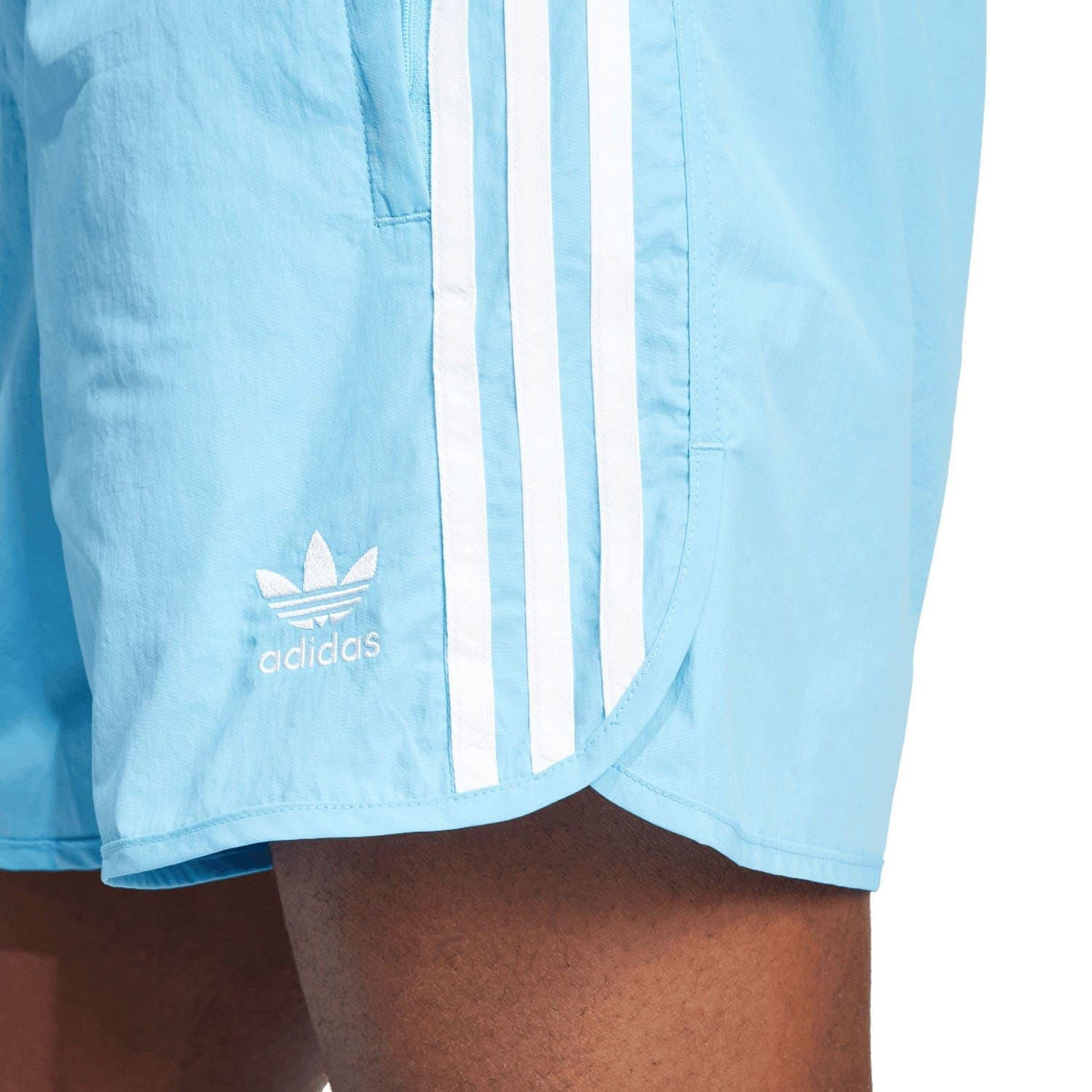 Light blue adidas Originals sprinter shorts detail with adidas logo and three white stripes