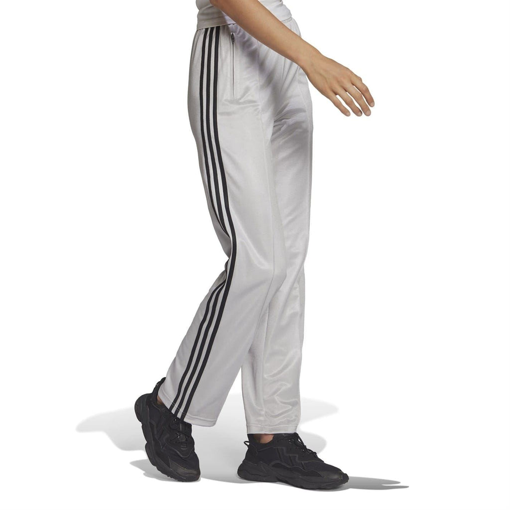 Light gray sweatpants with black triple stripes on the side and tapered ankle