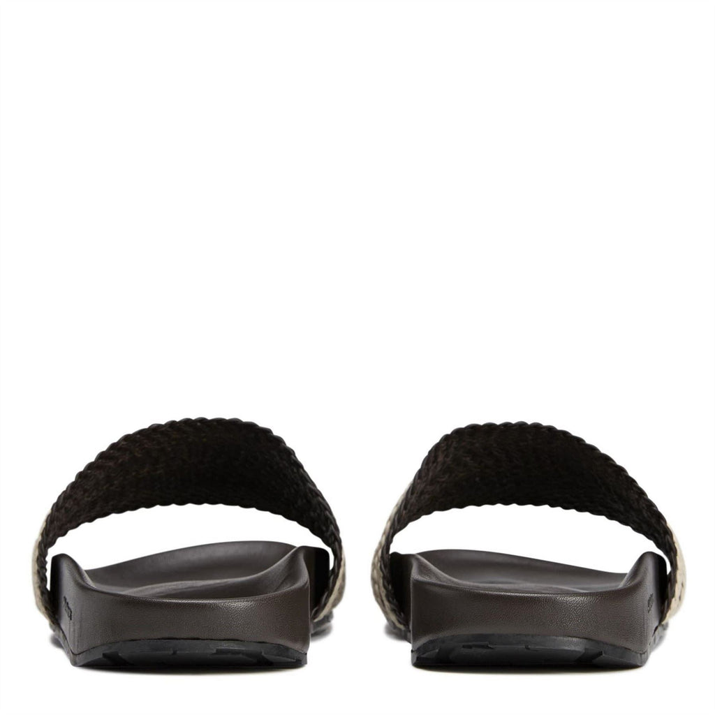 Back view of dark brown adidas adilette slides with braided top strap