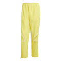 adidas Originals yellow track jogger pants with elastic waist and open cuff hems