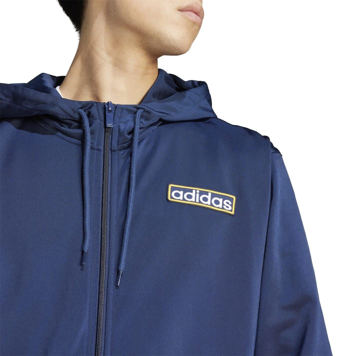 Dark blue hooded track jacket with adidas chest logo and adjustable drawstring hood