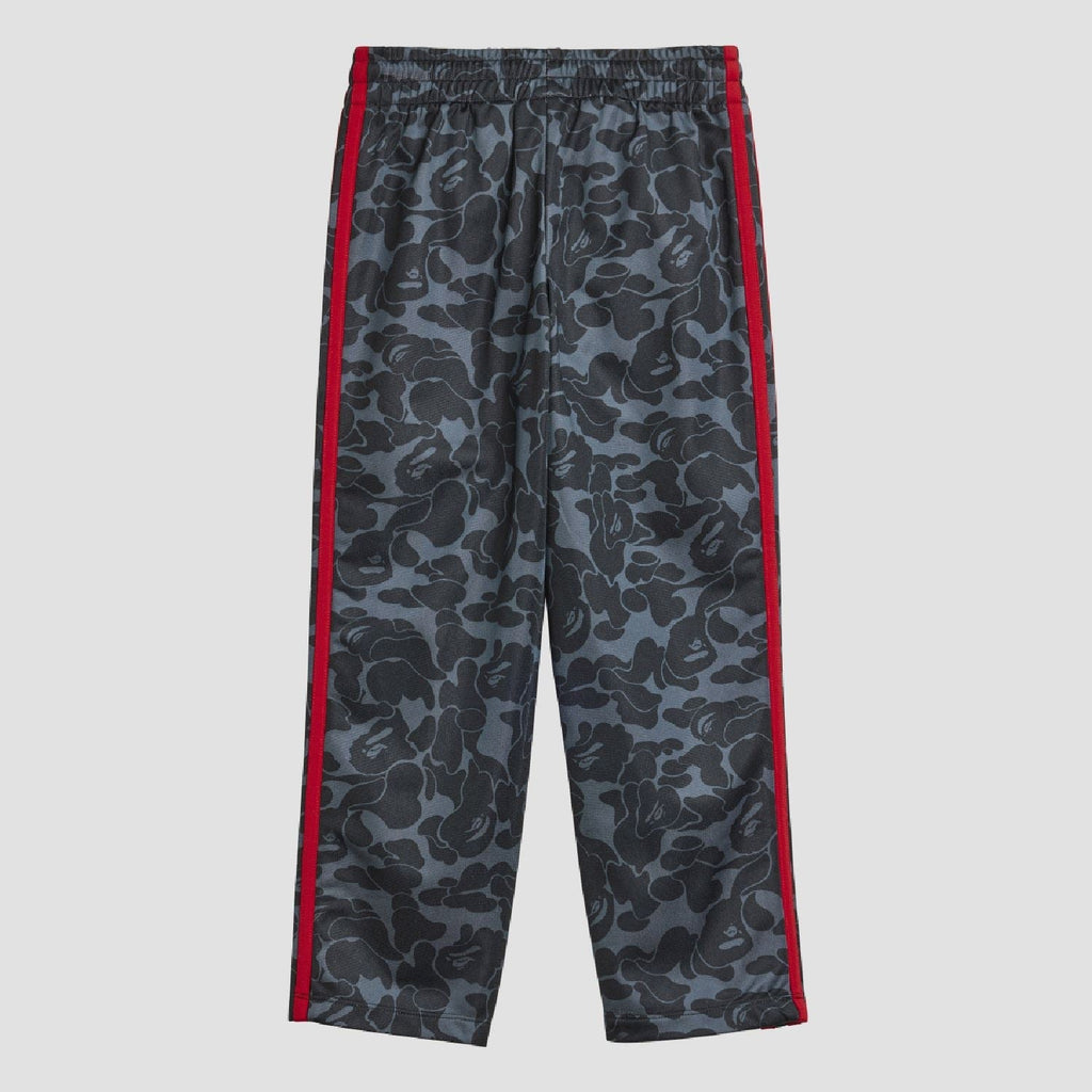 Kids camo track pants with red side stripes and elastic waistband