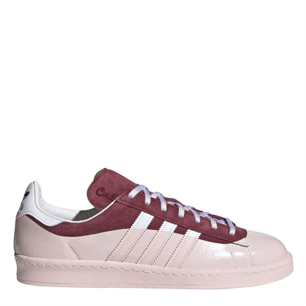 Colorblock low-top trainers with burgundy suede panels, white stripes, and lace-up front