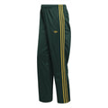 Adidas Originals Firebird track pants in dark green with yellow side stripes